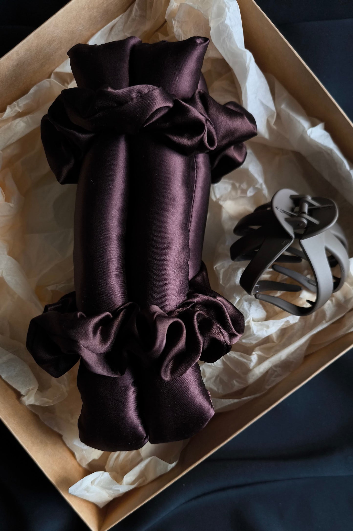 Brwon satin hair curler in a box with white tissue paper