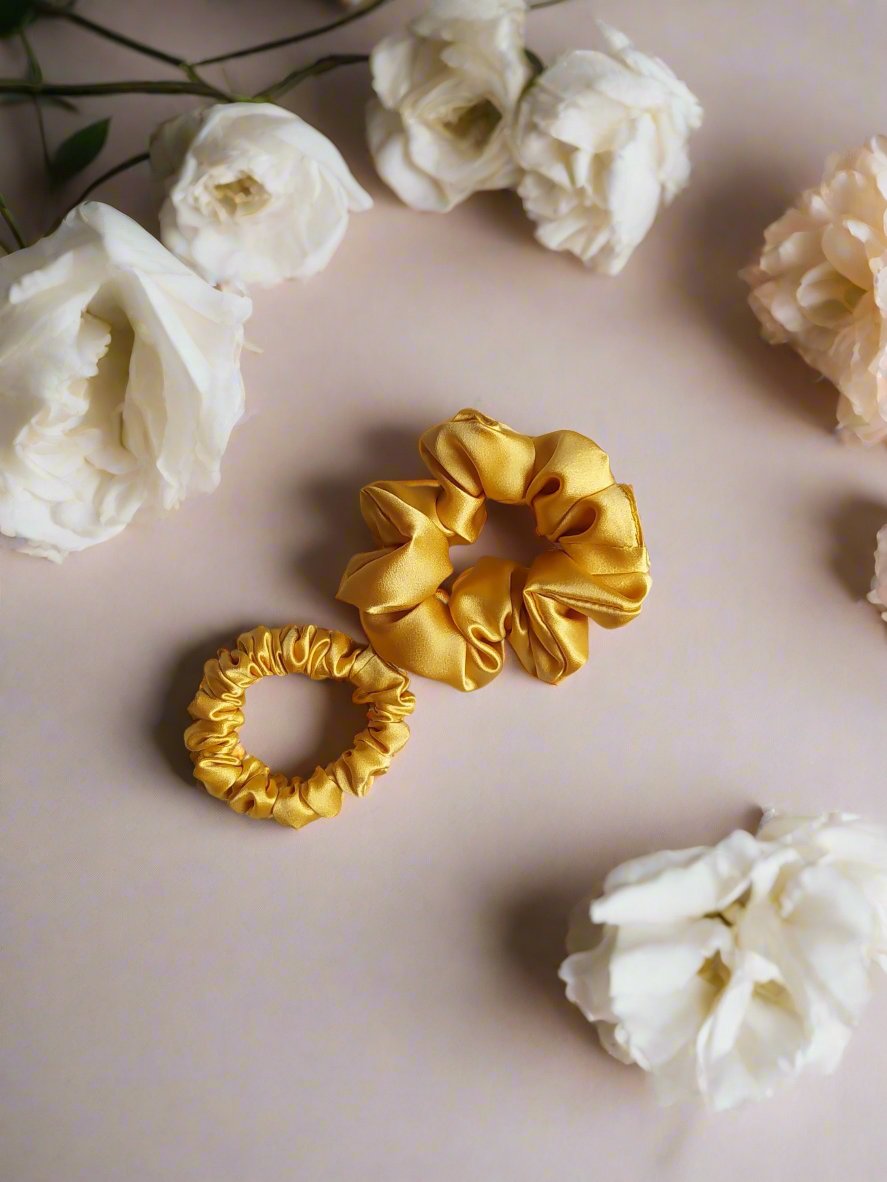 Dzeltena zīda matu gumija